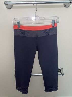lululemon athletica Black Capri Leggings with Coral Fold-Over Waistband
